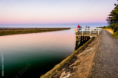 A Group of locals fishing along Moyne river in Griffiths island