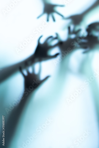 Abstract and spooky defocused hand.