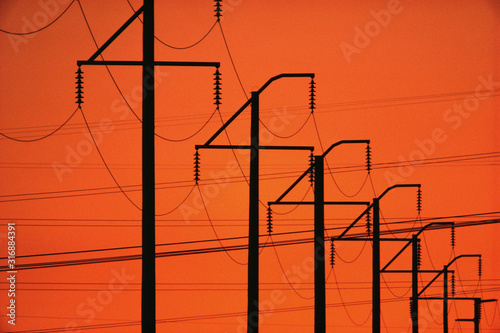 Silhouetted telephone lines photo