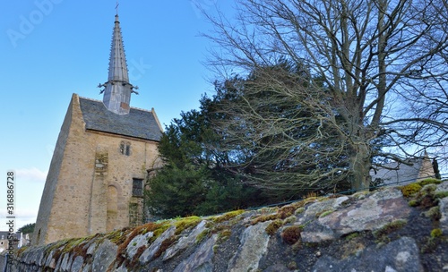 The famous tower bell of the Saint-Gonery church at Plougrescant in Brittany. France photo