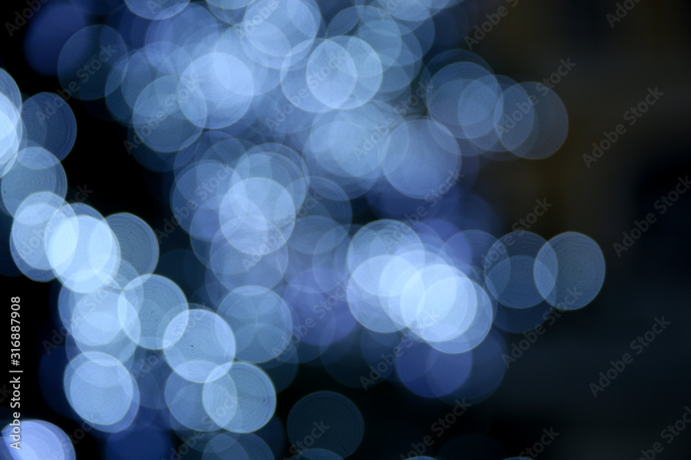 background with blurred circles of lights. defocused lights of festive garland background with blurred circles of lights. defocused lights of festive garland