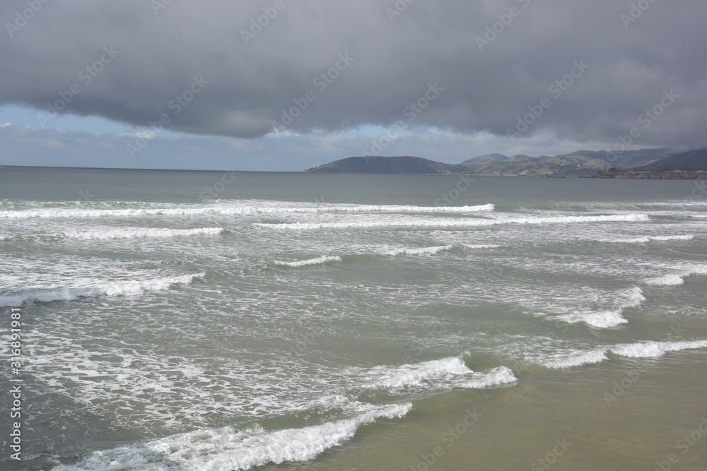 waves breaking on beach