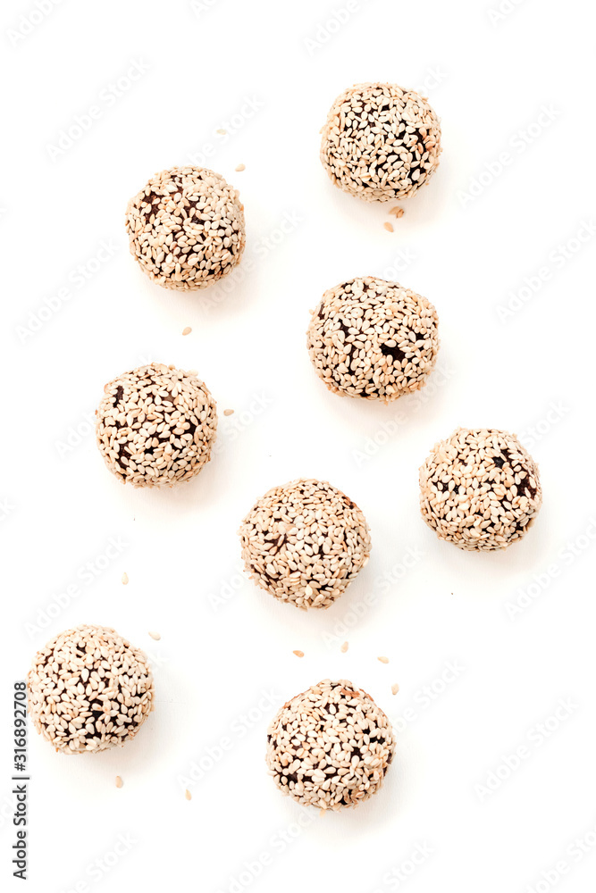 Sweets with sesame seeds. Raw handmade sweets. Healthy low-calorie sweets for vegetarians. Sweets with sesame seeds. Raw handmade sweets. Healthy low-calorie sweets for vegetarians.