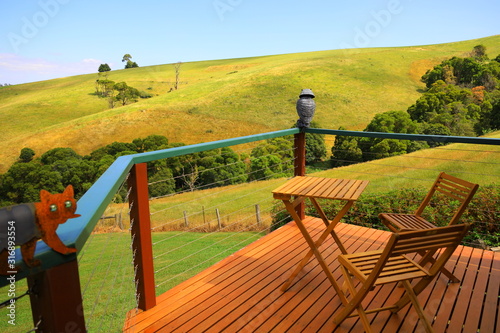 wooden deck look out to the mountain landscape