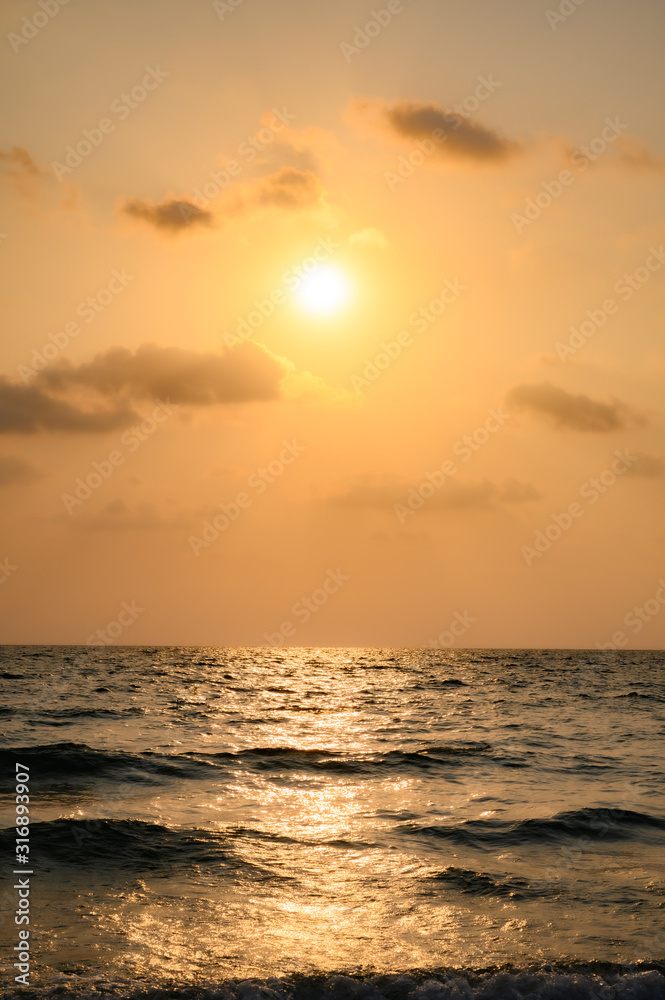 Fototapeta premium Beautiful sunset above sea.