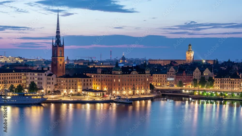 Panoramic view of Gamla Stan at dawn. Stockholm city skyline. Clouds move across the purple sky. Time lapse video. Panoramic view of Gamla Stan at dawn. Stockholm city skyline. Clouds move across the purple sky. Time lapse video.