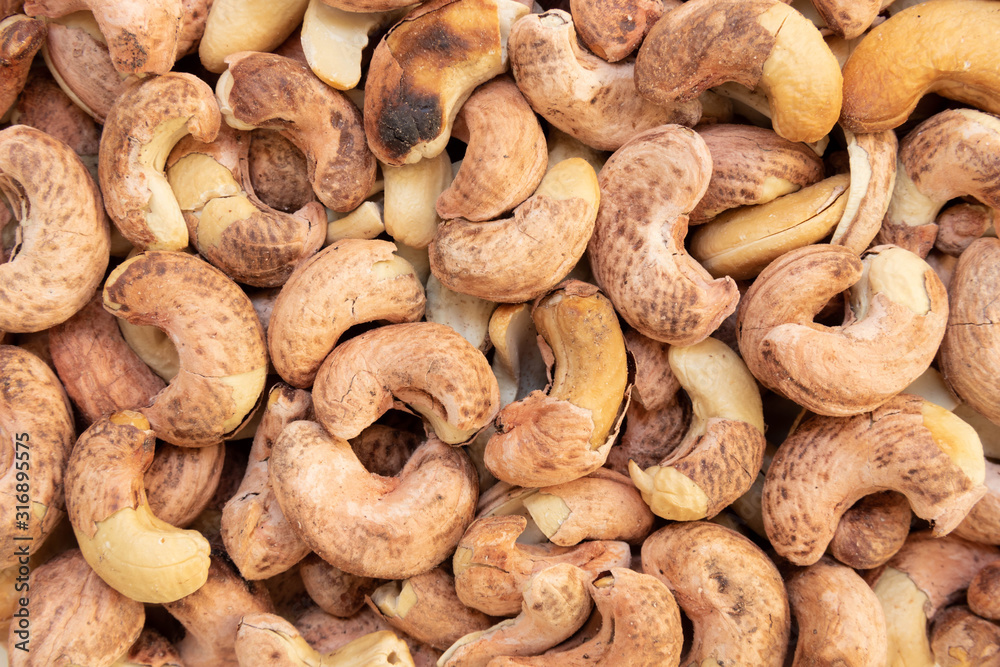 Top view of Roasted Cashew Nut for Background Top view of Roasted Cashew Nut for Background