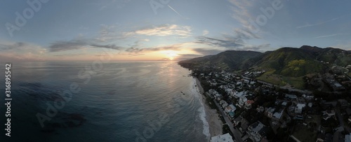 Ultrawide Aerial Shot of California coastline at sunset