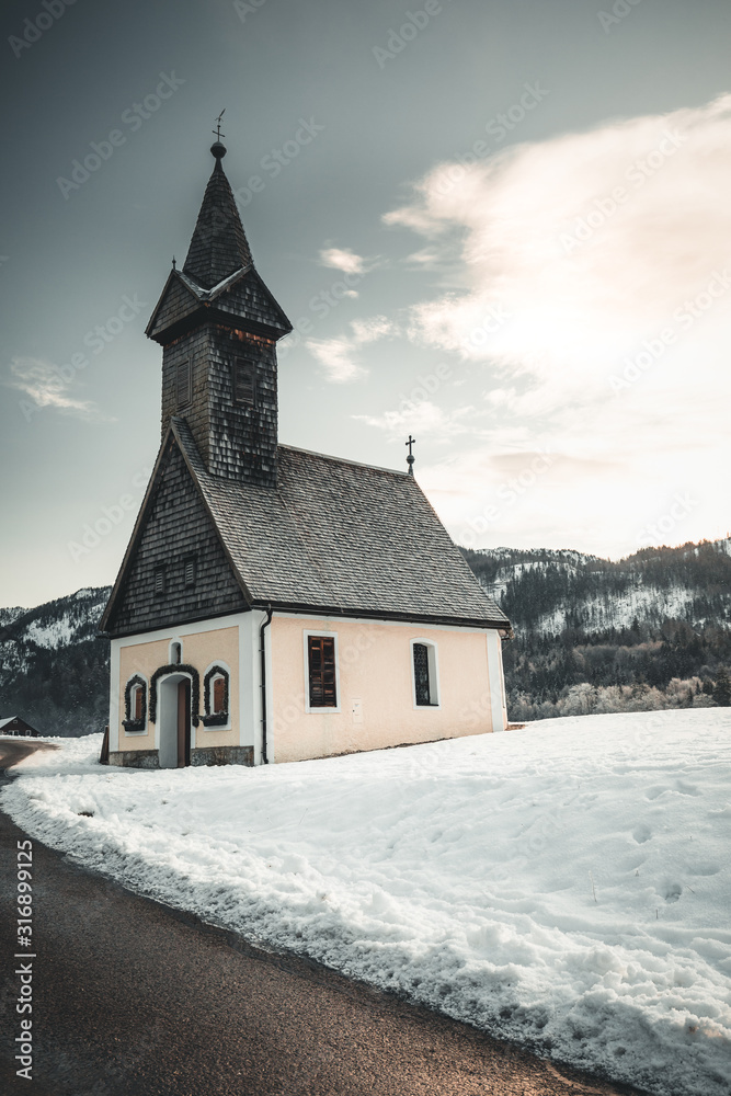 Beautiful winter landscape with old church