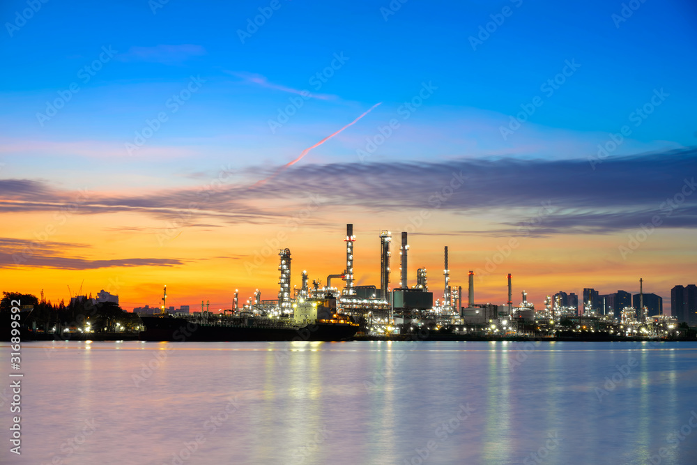 Fototapeta Oil refining and Petrochemical industry along the river