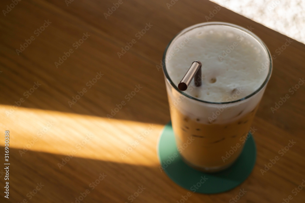 Glass of milk coffee drink on wooden table Glass of milk coffee drink on wooden table