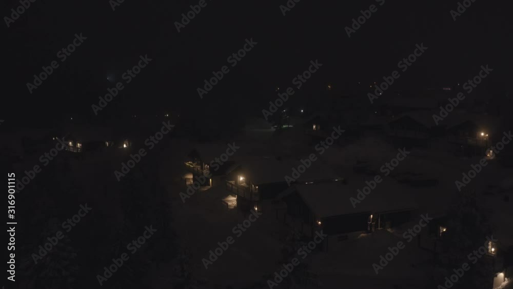 AERIAL: flight over ski town during night. Sweden, Sälen. AERIAL: flight over ski town during night. Sweden, Sälen.
