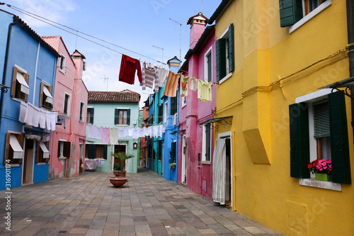Colorful buildings in Italy with clothes lines