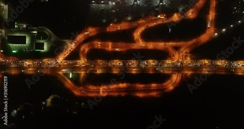 4K Aerial Top Drone View: Accident and traffic jam on the bridge in the evening after a working day. A huge number of cars on the road at rush hour. Downtown, city central part. Dnipro, Ukraine