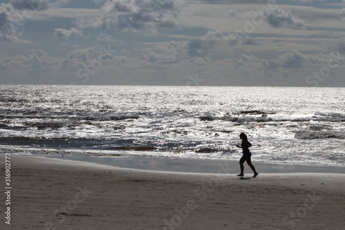 woman walking on the beach