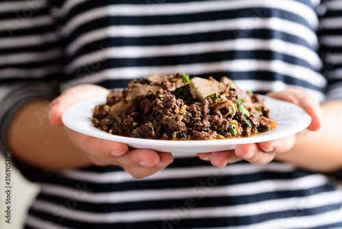 Northern Thai food, spicy minced pork salad (Larb Moo Kua) photo