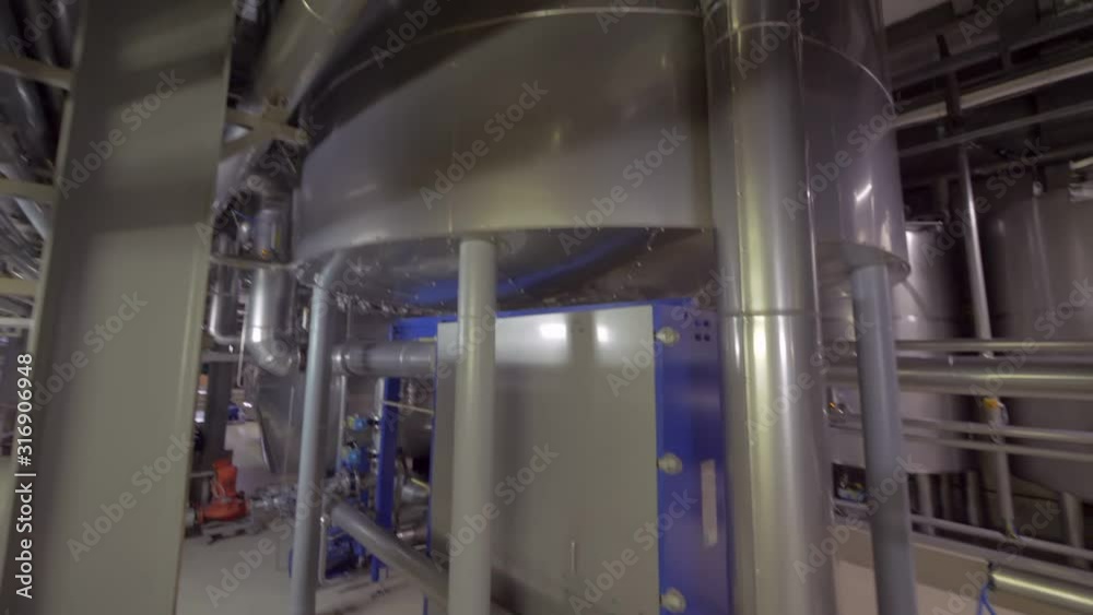 panoramic view of modern equipment inside brewhouse of brewery panoramic view of modern equipment inside brewhouse of brewery