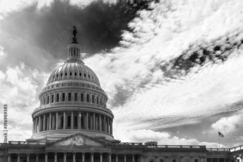 Capitol Building with dramatic sky in summer, black and white landmark building background, Washington DC