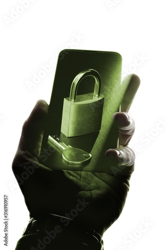 Cool photo of a person holding a mobile device with a lock - web security and proection concept photo