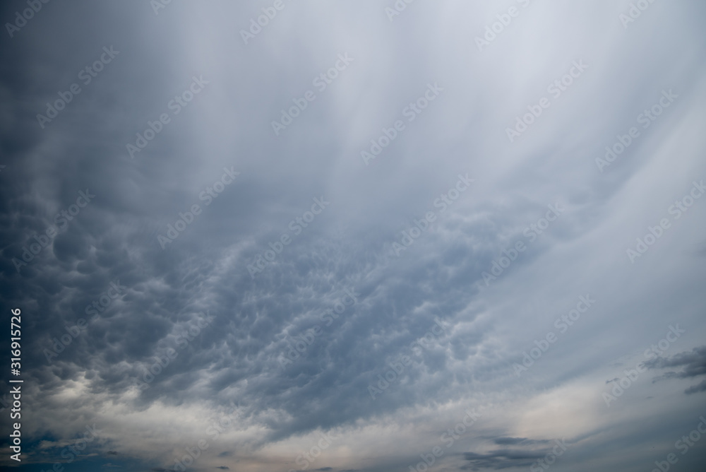 dark storm clouds with background,Dark clouds before a thunder-storm.