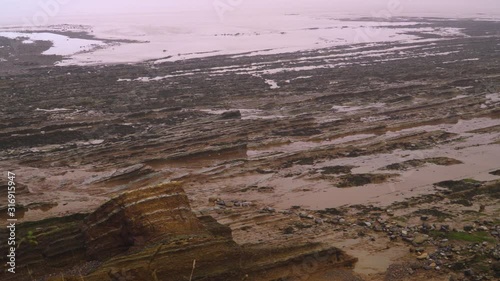 WATCHET, SOMERSET, UNITED KINGDOM, December 30, 2019: Very beautiful Watchet beach in the Jurassic coast of Somerset.  photo