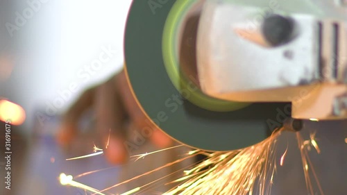 Closeup of metal cutting at factory photo