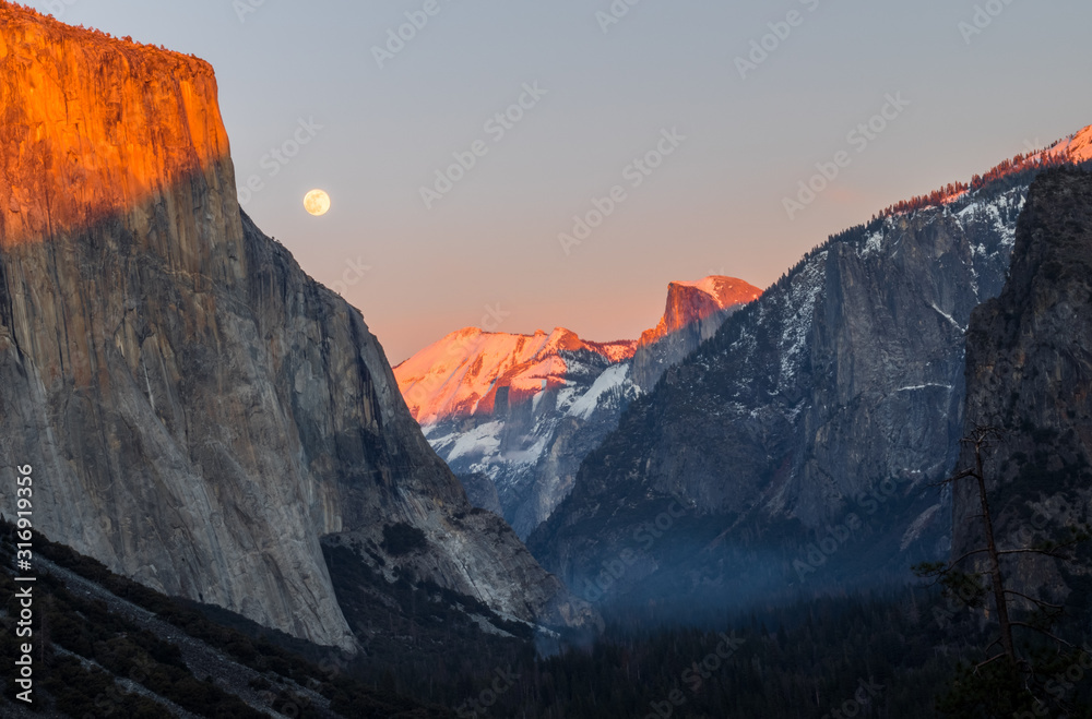Yosemite national park at sunset with a full moon