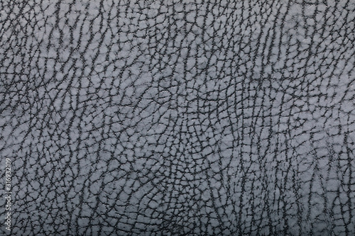 Light gray, silver leather fullframe texture closeup macro