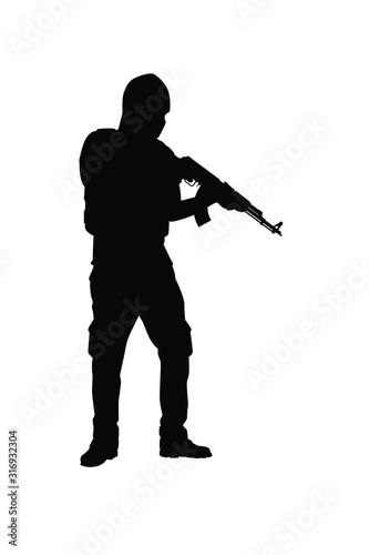A terrorist with his weapon silhouette vector