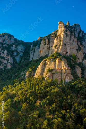 BARCELONA  SPAIN - December 26  2018  The mountains of Montserrat in Barcelona  Spain. Montserrat  is a Spanish shaped mountain which influenced Antoni Gaudi to make his art works.