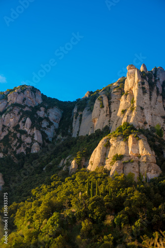 BARCELONA, SPAIN - December 26, 2018: The mountains of Montserrat in Barcelona, Spain. Montserrat  is a Spanish shaped mountain which influenced Antoni Gaudi to make his art works. © J Photography