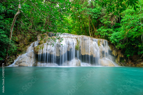 Waterfall in Tropical forest at Erawan waterfall National Park  Thailand