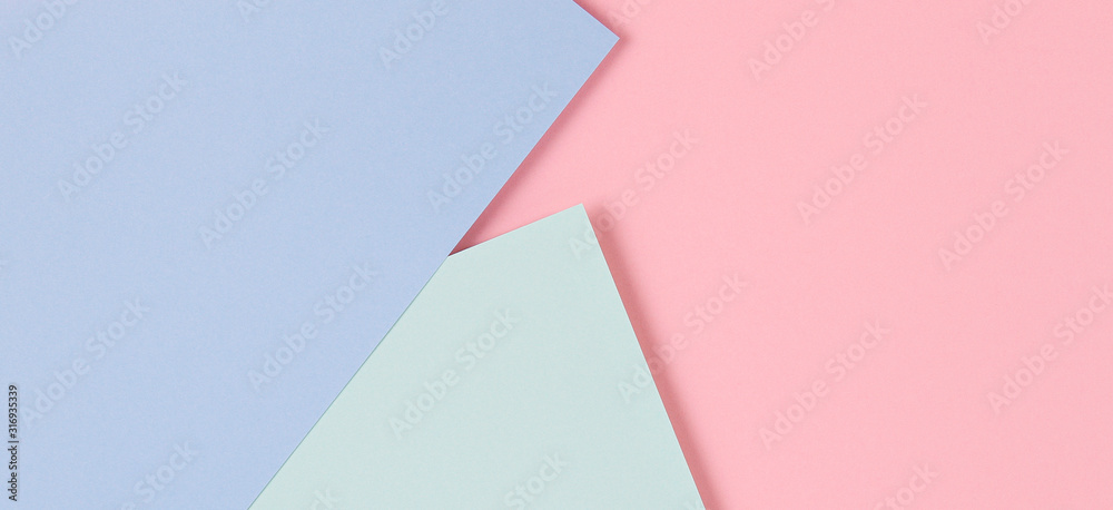 Abstract colored paper texture background. Minimal geometric shapes and lines in pastel pink, light blue and green colours Abstract colored paper texture background. Minimal geometric shapes and lines in pastel pink, light blue and green colours