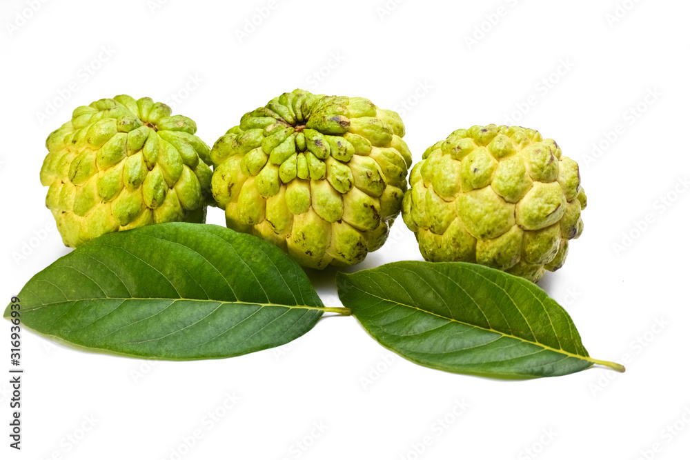 Fototapeta premium Sugar apple or custard apple with green leaf isolated on white background
