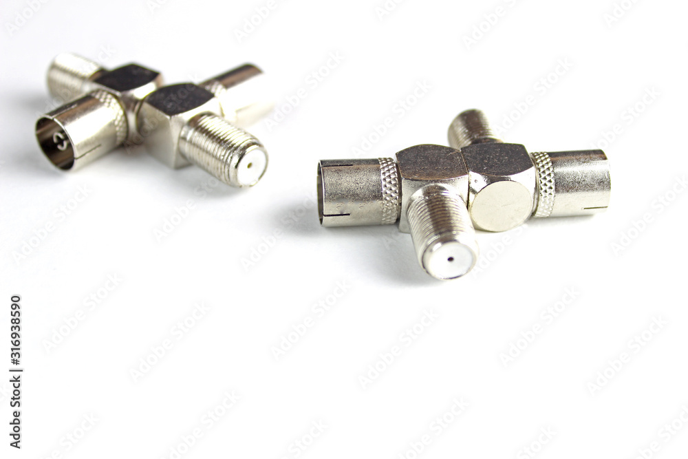 Metal adapter for internet networks isolated on white background. Metal adapter for internet networks isolated on white background.