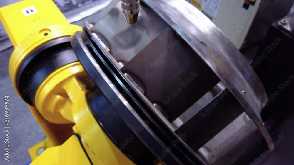 An industrial welding robot simulates a fan wheel welding process An industrial welding robot simulates a fan wheel welding process