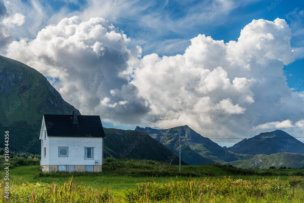 Solitary house in a medadow, Lofoten Islands, Norway Solitary house in a medadow, Lofoten Islands, Norway