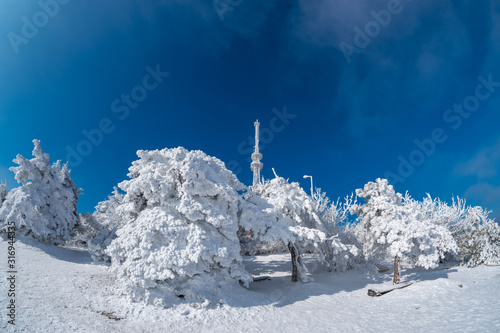 The snow-capped peak of Mount Mashuk