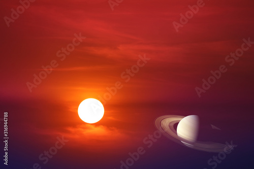 sunset sky back on red cloud and colse up to rings of saturn planet