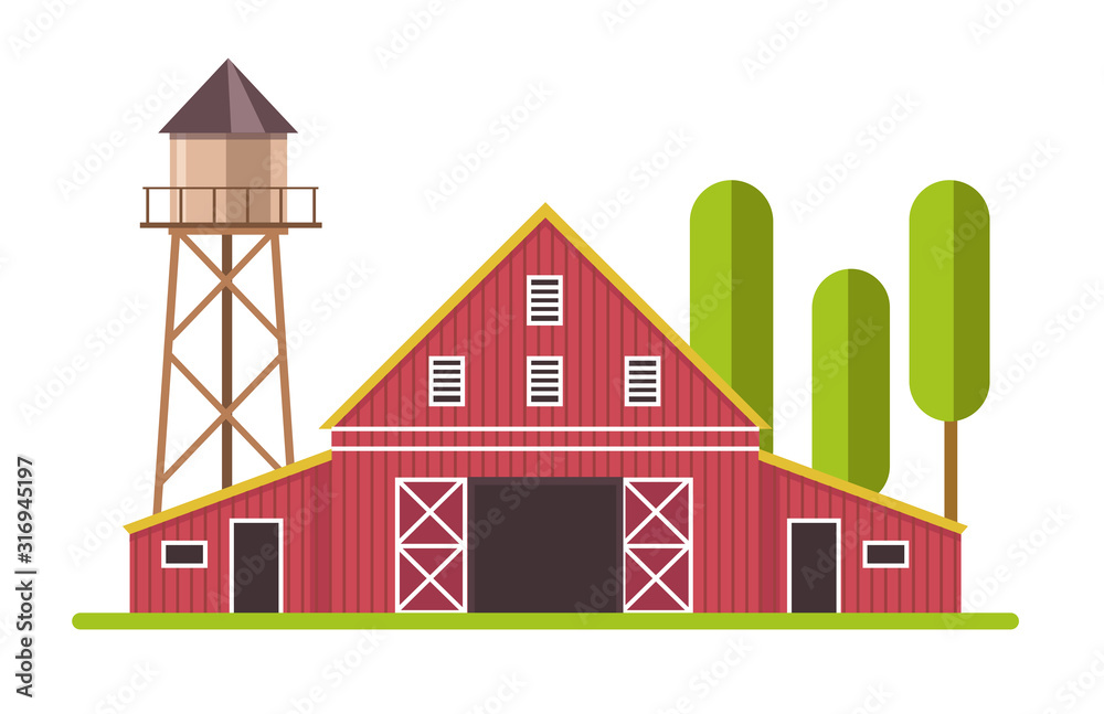 Red and white barn and water tower at farm land