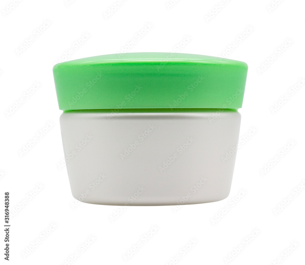 plastic jar for cosmetic cream, gel or powder, with a green cover. isolated on white plastic jar for cosmetic cream, gel or powder, with a green cover. isolated on white