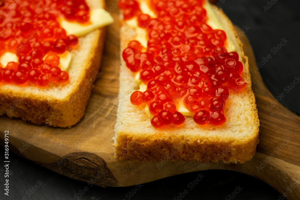 sandwich with butter and red caviar sandwich with butter and red caviar
