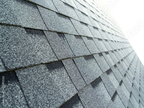 selective focus of new asphalt shingle roof photo