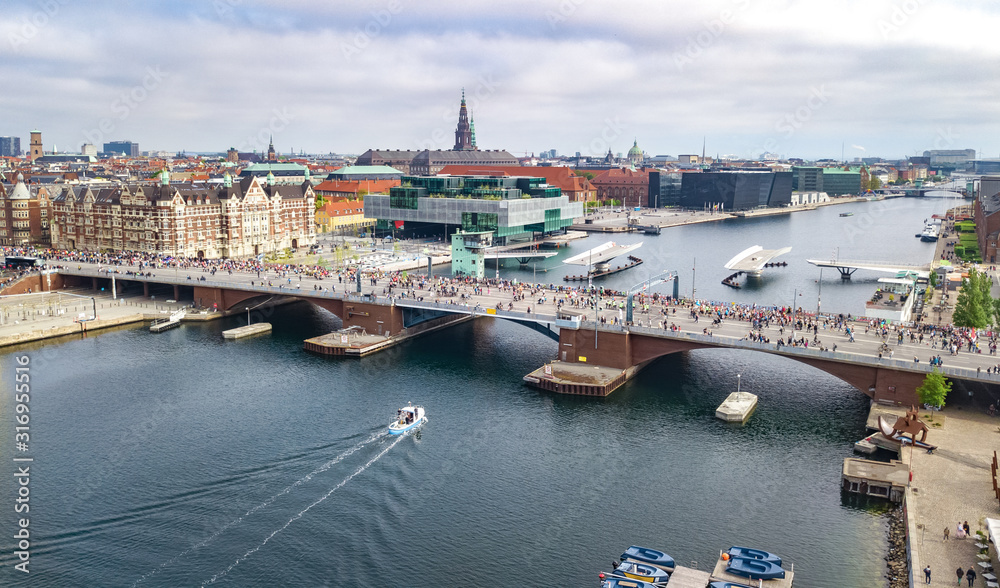 Marathon running race, aerial view of many runners on bridge from above, road racing, sport competition, Copenhagen marathon, Denmark