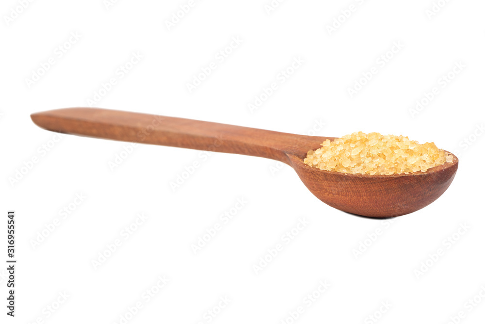 Brown sugar in spoon Brown sugar in spoon