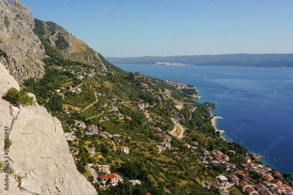 View of the Adriatic Sea from the walls of the medieval pirate fortress Stari Grad in Omis, Croatia
