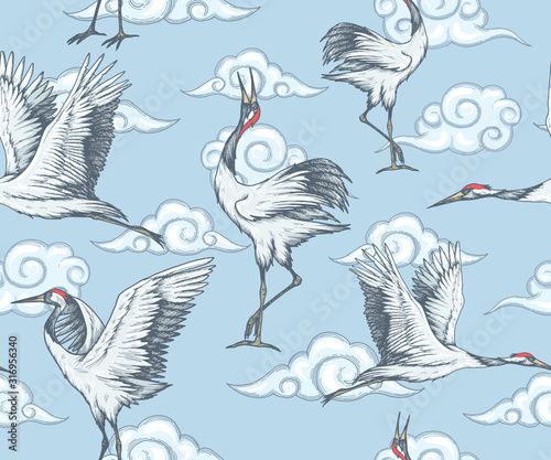Seamless pattern with cranes and clouds in japanese style