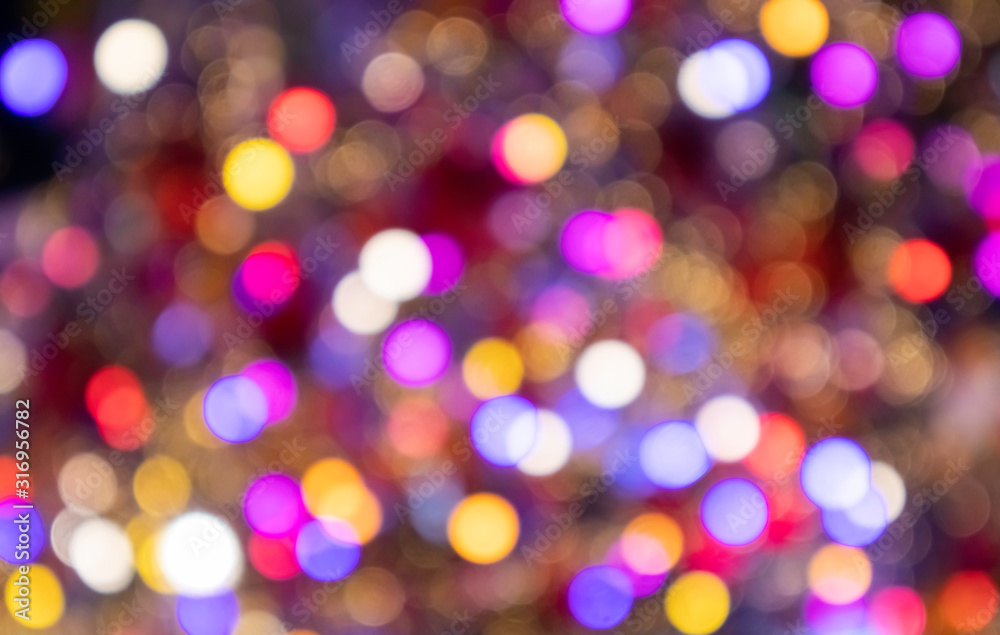 Fototapeta premium Colorful beautiful blurred bokeh background .,Holiday texture,Celebrate,Glitter multicolored light spots on backdrop.