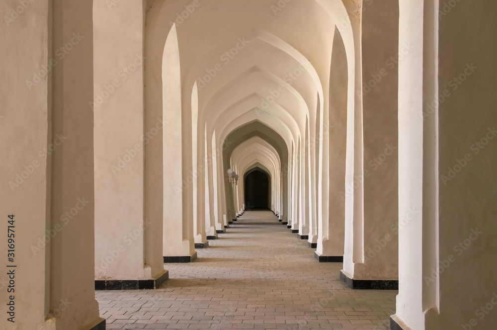 Corridor of arches in the Bukhara city