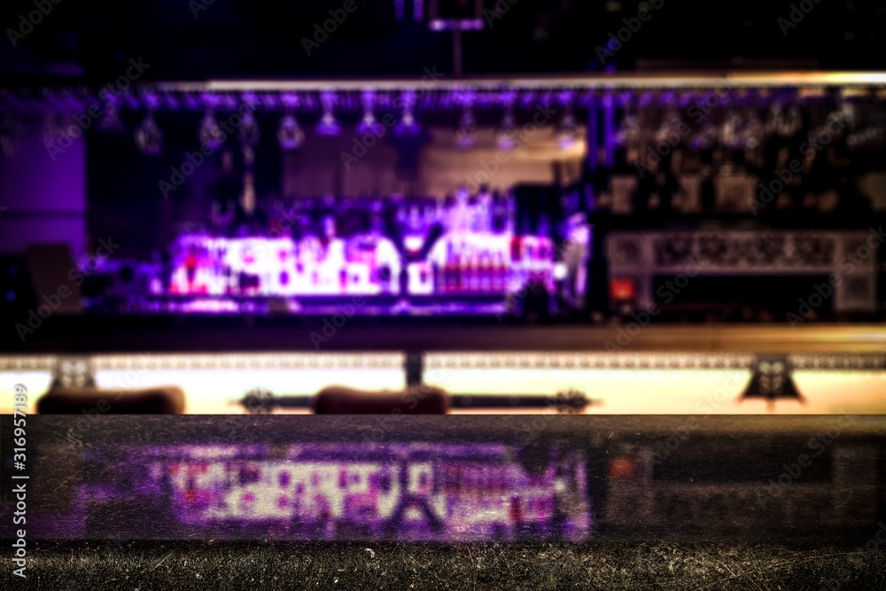 Fototapeta premium Desk of free space and blurred background of bar 